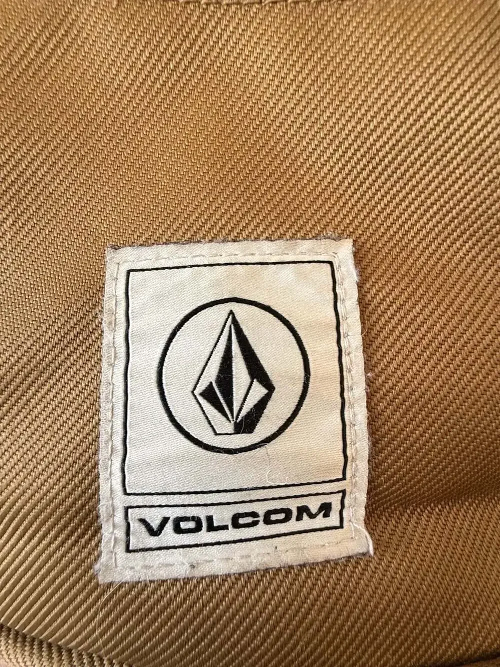Volcom Brown and Green Flap Backpack with Buckle Straps excellent condition.